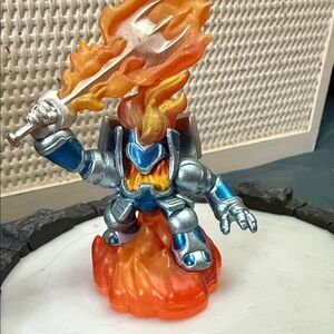 Nintendo Blue and Silver Figurine with Orange Flames